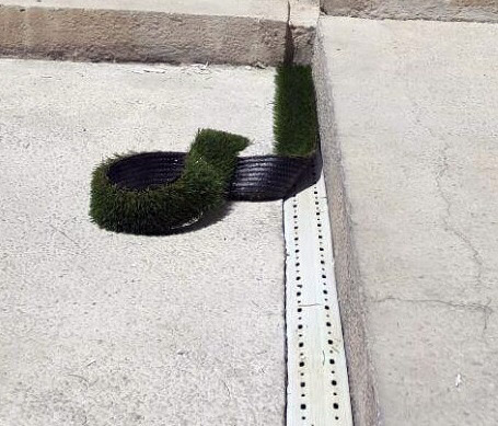 نصب چمن مصنوعی بین سنگ 6